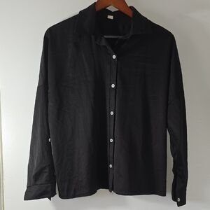 Classic Black Shirt with White Buttons